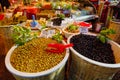 Olives of different varieties and sizes are sold at a market
